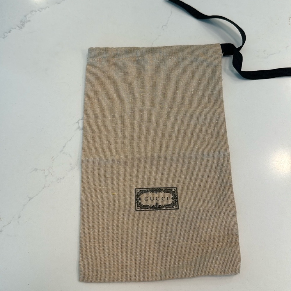 Gussi dust bag from belt